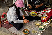 Bangkok Wat Arun - The work of chipping pottery for the restoration work. 